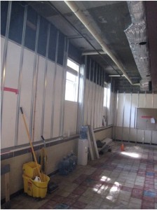 New wall installation going up in the Great Hall -- no more cinderblock!
