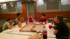 Part of the chair-washing crew enjoys the First Supper in the new Great Hall