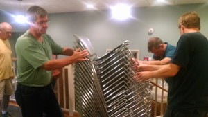 Saturday morning the Men of Redeemer moved the chairs into the new hall.