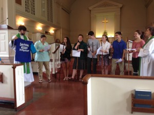 Blessing the J2A pilgrims as they receive their staffs.